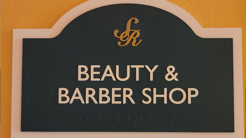 Sign for the beauty salong and barber shop at Superior Residence of Lecanto