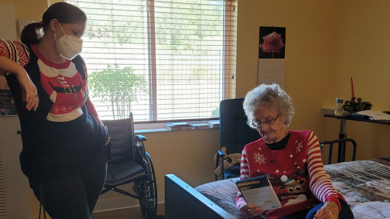 Resident being assisted by staff member at Superior Residences of Lecanto