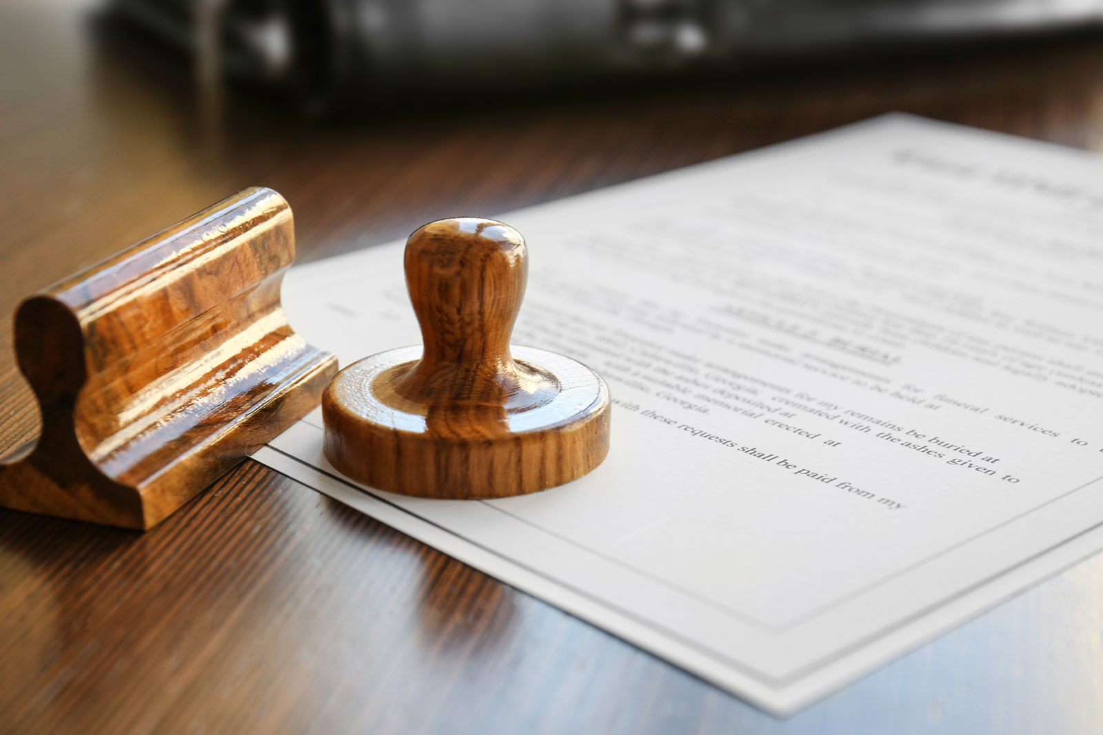Paper with two stamps on table
